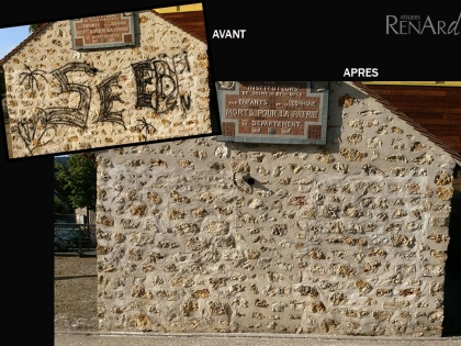 Nettoyage de graffitis d'un mur en pierres