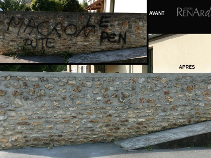 Décapage par aérogommage et nettoyage de graffitis d'un mur en pierres