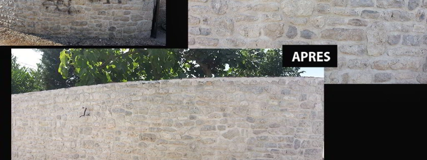 Décapage par aérogommage et nettoyage de graffitis d'un mur en pierres