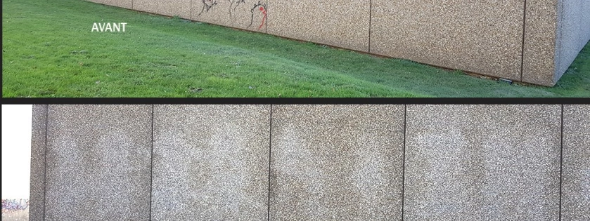 Nettoyage de graffitis d'un mur en pierres